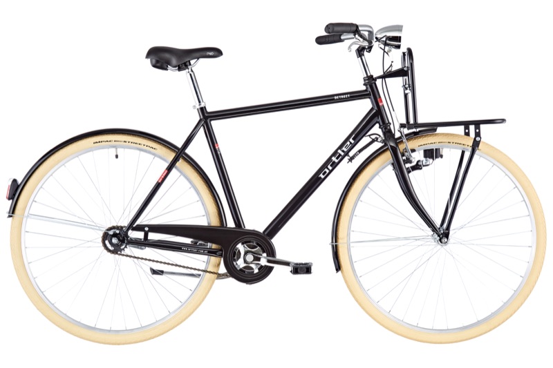 Schwarzes Retro-Herrenrad mit Frontgepäckträger und Cremereifen, Seitenansicht